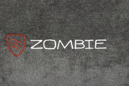 Кресло игровое Zombie Ghost Fabric серый Light-19 с подголов. крестов. пластик