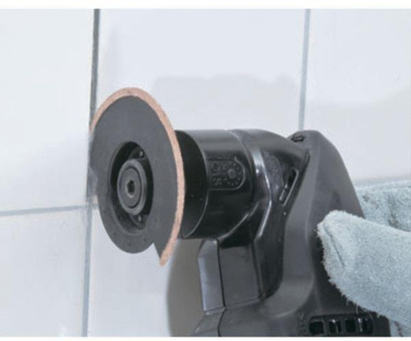 Многофункциональный инструмент Makita DTM50Z синий