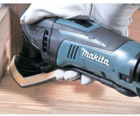 Многофункциональный инструмент Makita DTM50Z синий