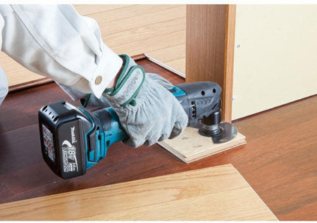 Многофункциональный инструмент Makita DTM50Z синий