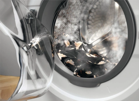 Стиральная машина Electrolux EW6SM404W пан.англ. кл.:A+++ фронт. макс.:4кг (с сушкой) белый
