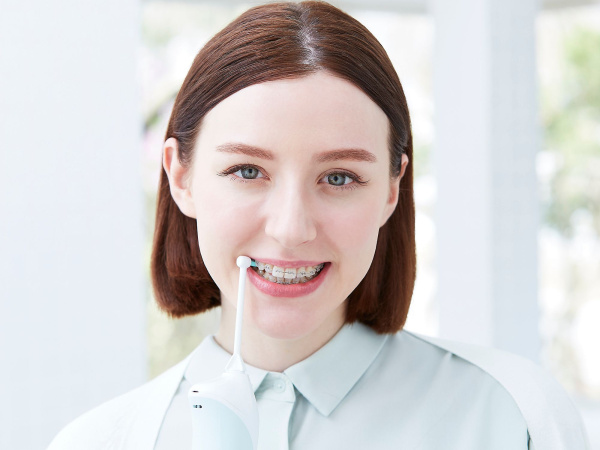 Ирригатор Panasonic EW1313 микроп.техн. 2насад. белый/бирюзовый