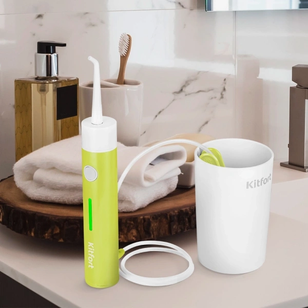 Ирригатор Kitfort КТ-2957-2 портатив. 2насад. зеленый/белый