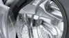 Стиральная машина Bosch Serie 8 WNC254ARSN пан.англ. класс: D загр.фронтальная макс.:10.5кг (с сушкой) серый